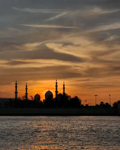Silhouette of the Sheikh Zayed Grand Mosque, Abu Dhabi, at sunset