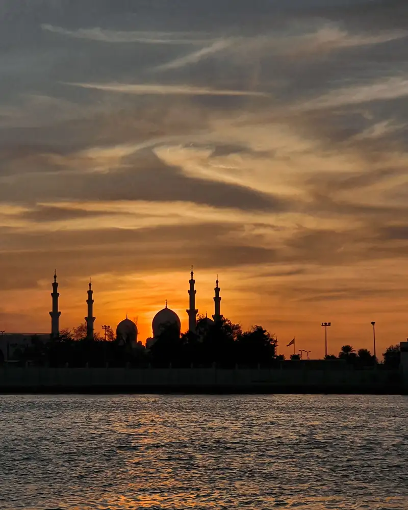 Silhouette of the Sheikh Zayed Grand Mosque, Abu Dhabi, at sunset
