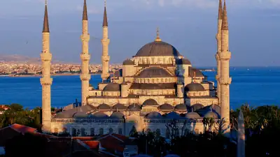 The Blue Mosque (Sultan Ahmed Mosque), Istanbul, at sunset above the Bosphorus